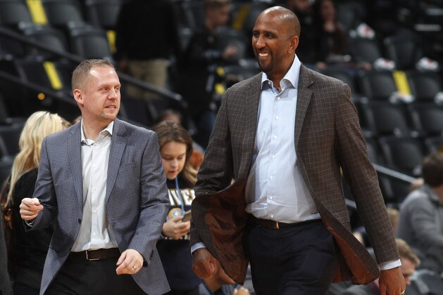 Denver Nuggets general manager Tim Connelly, left, and assistant Calvin Booth in the first half of an NBA basketball game Thursday, Nov. 9, 2017, in Denver. (AP Photo/David Zalubowski) Denver Nuggets general manager Tim Connelly, left, and assistant Calvin Booth in the first half of an NBA basketball game Thursday, Nov. 9, 2017, in Denver. (AP Photo/David Zalubowski)