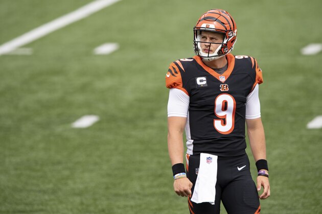 Cincinnati Bengals quarterback Joe Burrow (9) looks on during warm ups prior to a NFL football game against Los Angeles Chargers, Sunday, Sept. 13, 2020, in Cincinnati. (AP Photo/Emilee Chinn)