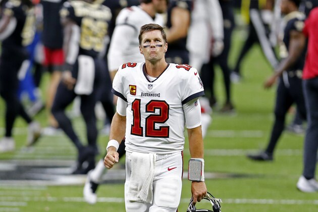 Tampa Bay Buccaneers quarterback Tom Brady (12) reacts after an NFL football game against the New Orleans Saints in New Orleans, Sunday, Sept. 13, 2020. The Saints won 34-23. (AP Photo/Brett Duke)