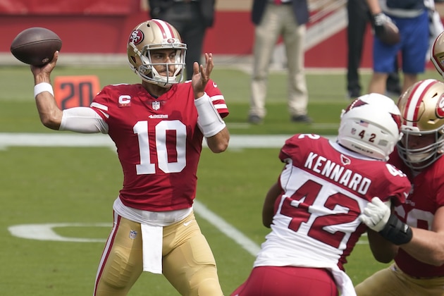 San Francisco 49ers quarterback Jimmy Garoppolo (10) passes against the Arizona Cardinals during the first half of an NFL football game in Santa Clara, Calif., Sunday, Sept. 13, 2020. (AP Photo/Tony Avelar)