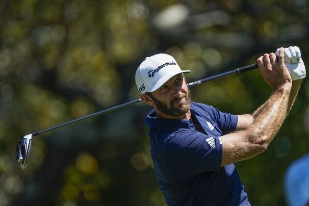 Dustin Johnson hits his tee shot on the fifth hole during the final round of the Tour Championship golf tournament at East Lake Golf Club in Atlanta, Monday, Sept. 7, 2020. (AP Photo/John Bazemore) Dustin Johnson hits his tee shot on the fifth hole during the final round of the Tour Championship golf tournament at East Lake Golf Club in Atlanta, Monday, Sept. 7, 2020. (AP Photo/John Bazemore)