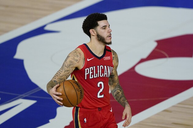 New Orleans Pelicans' Lonzo Ball (2) makes his way down the court during an NBA basketball game against the Memphis Grizzlies Monday, Aug. 3, 2020, in Lake Buena Vista, Fla. (AP Photo/Ashley Landis, Pool)