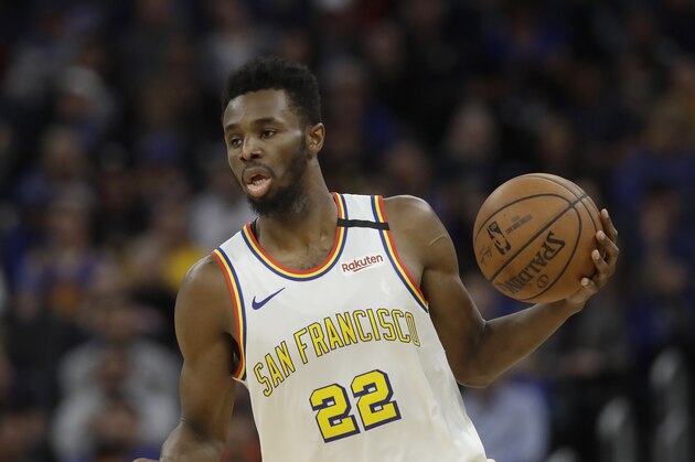 Golden State Warriors guard Andrew Wiggins (22) against the Toronto Raptors during an NBA basketball game in San Francisco, Thursday, March 5, 2020. (AP Photo/Jeff Chiu)