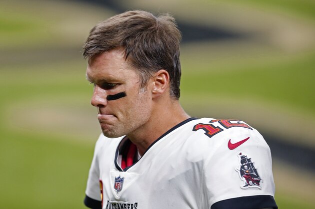 Tampa Bay Buccaneers quarterback Tom Brady (12) walks off the field after an NFL football game against the New Orleans Saints in New Orleans, Sunday, Sept. 13, 2020. (AP Photo/Brett Duke)