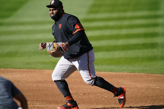 San Francisco Giants third baseman Pablo Sandoval warms up before the team's baseball game against the Colorado Rockies on Tuesday, Sept. 1, 2020, in Denver. (AP Photo/David Zalubowski)