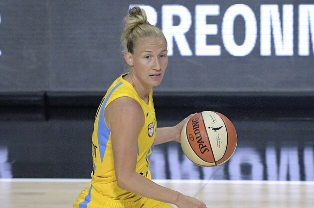 Chicago Sky guard Courtney Vandersloot (22) brings the ball up the court during the first half of a WNBA basketball game against the Las Vegas Aces, Sunday, July 26, 2020, in Bradenton, Fla. (AP Photo/Phelan M. Ebenhack)