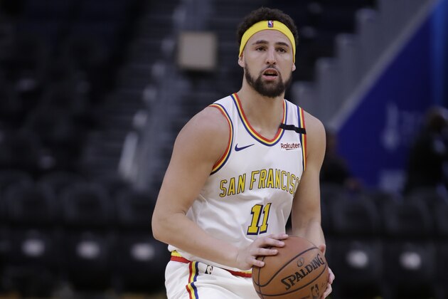 Golden State Warriors' Klay Thompson warms up prior to an NBA basketball game against the Denver Nuggets Thursday, Jan. 16, 2020, in San Francisco. (AP Photo/Ben Margot)