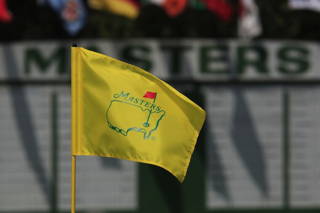 The Masters logo is seen on a flag on the course at Augusta Country club during a practice round for the Masters golf tournament in Augusta, Ga., Monday, April 5, 2010. The tournament begins Thursday, April, 8. (AP Photo/Charlie Riedel)