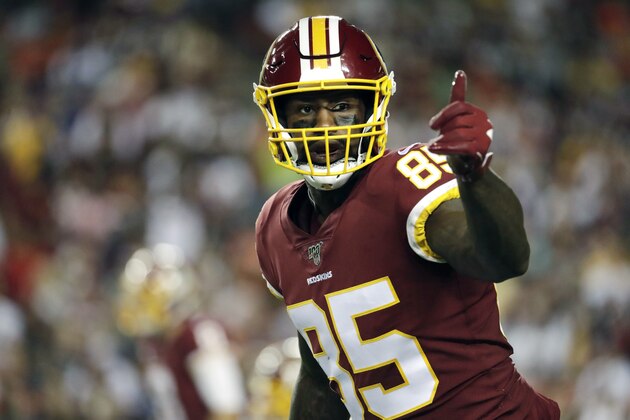 FILE - In this Monday, Sept. 23, 2019 file photo, Washington Redskins tight end Vernon Davis gestures toward a line judge during the first half of an NFL football game against the Chicago Bears in Landover, Md. Vernon Davis has decided to retire after 14 NFL seasons, Monday, Feb. 3, 2020. The 36-year-old says he wanted to walk away from football while his body was still healthy enough for him to pursue business and television opportunities. (AP Photo/Julio Cortez, File)