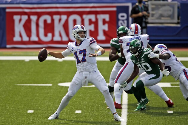 Buffalo Bills quarterback Josh Allen (17) throws a pass during the first half of an NFL football game against the New York Jets in Orchard Park, N.Y., Sunday, Sept. 13, 2020. (AP Photo/John Munson)