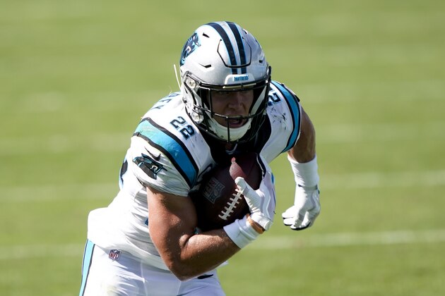Carolina Panthers running back Christian McCaffrey runs against the Las Vegas Raiders during the second half of an NFL football game Sunday, Sept. 13, 2020, in Charlotte, N.C. (AP Photo/Brian Blanco)