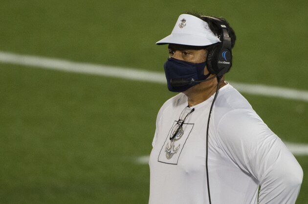 Navy head coach Ken Niumatalolo looks ontonthe field during the second half of an NCAA college football game against the BYU, Monday, Sept. 7, 2020, in Annapolis, Md. (AP Photo/Tommy Gilligan)