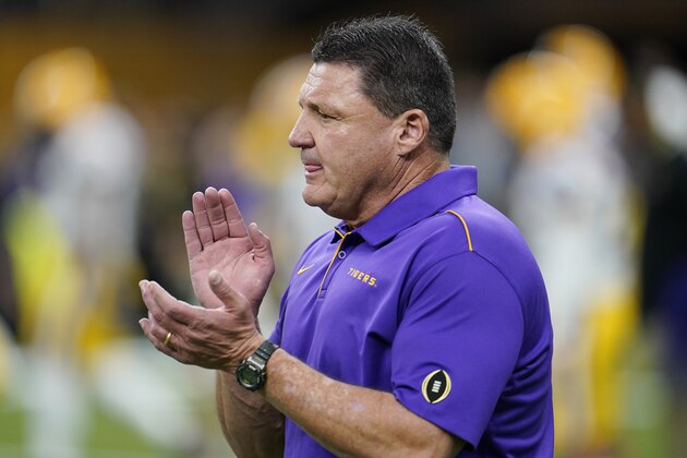 LSU head coach Ed Orgeron watches during warm ups before before a NCAA College Football Playoff national championship game Monday, Jan. 13, 2020, in New Orleans. (AP Photo/David J. Phillip) LSU head coach Ed Orgeron watches during warm ups before before a NCAA College Football Playoff national championship game Monday, Jan. 13, 2020, in New Orleans. (AP Photo/David J. Phillip)