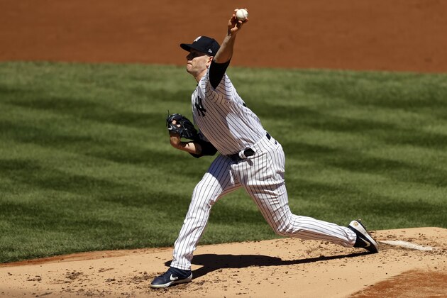 New York Yankees pitcher James Paxton (65) delivers a pitch against the Tampa Bay Rays during the first inning of a baseball game Thursday, Aug. 20, 2020, in New York. (AP Photo/Adam Hunger)