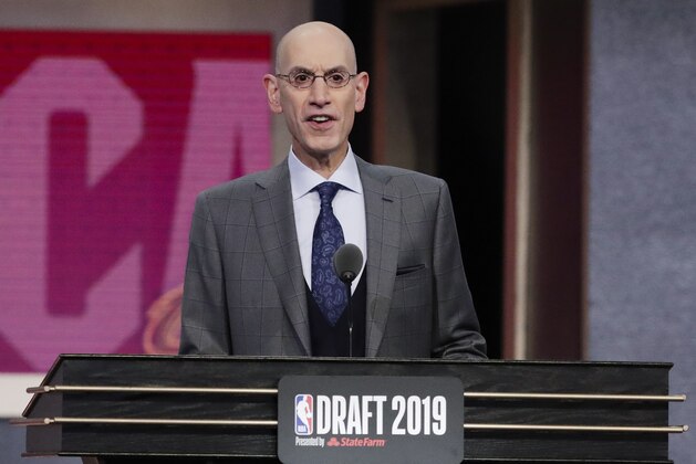 NBA Commissioner Adam Silver announces Vanderbilt's Darius Garland as the fifth pick overall by the Cleveland Cavaliers in the NBA basketball draft Thursday, June 20, 2019, in New York. (AP Photo/Julio Cortez)