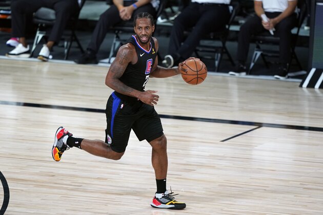 Los Angeles Clippers' Kawhi Leonard (2) plays against the Dallas Mavericks during the first half of an NBA basketball game Wednesday, Aug. 19, 2020, in Lake Buena Vista, Fla. (AP Photo/Ashley Landis, Pool)