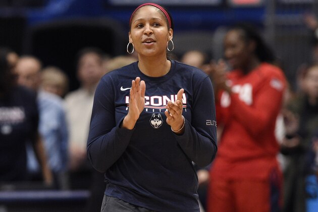 Former Connecticut player and Minnesota Lynx Maya Moore, is announced for a ceremony before a basketball game, Monday, Jan. 27, 2020, in Hartford, Conn. (AP Photo/Jessica Hill)