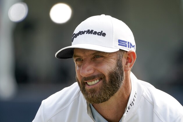 Dustin Johnson, of the United States, prepares to tee off during a practice round for the US Open Golf Championship, Wednesday, Sept. 16, 2020, in New York. (AP Photo/Charles Krupa)