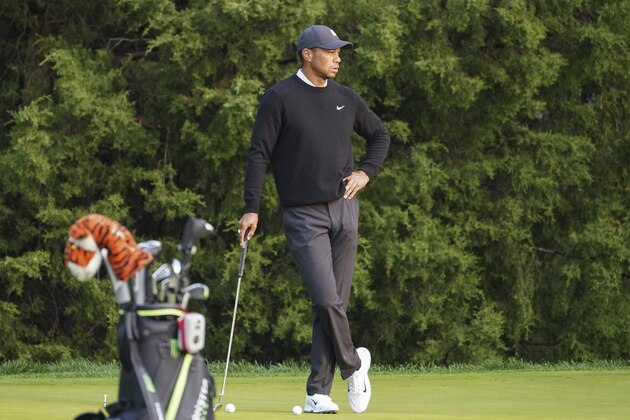 Tiger Woods pauses on the fourth tee during practice before the U.S. Open Championship golf tournament at Winged Foot Golf Club, Wednesday, Sept. 16, 2020, in Mamaroneck, N.Y. (AP Photo/John Minchillo)