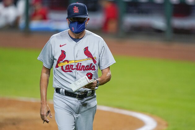 St. Louis Cardinals manager Mike Shildt (8) walks to the dugout during a baseball game against the Cincinnati Reds at the Great American Ballpark, in Cincinnati, Tuesday, Sept. 1, 2020. (AP Photo/Bryan Woolston)