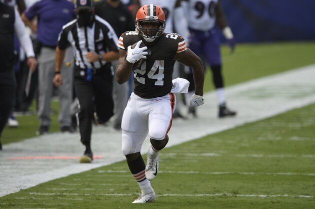 Cleveland Browns running back Nick Chubb (24) runs with the ball during an NFL football game against the Baltimore Ravens, Sunday, Sept. 13, 2020, in Baltimore. (AP Photo/Nick Wass)