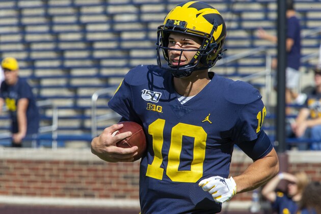 Michigan quarterback Dylan McCaffrey (10) jogs on the field during warmups before an NCAA football game against Army in Ann Arbor, Mich., Saturday, Sept. 7, 2019. (AP Photo/Tony Ding)