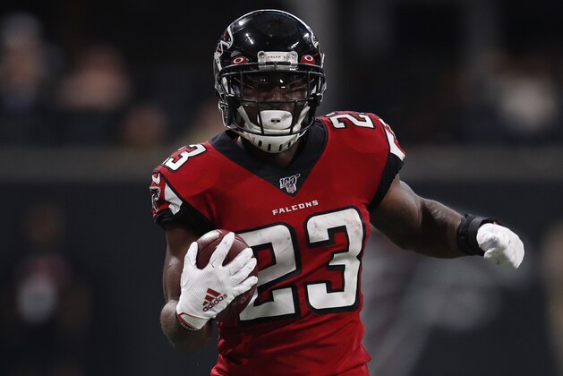 Atlanta Falcons running back Brian Hill (23) runs the ball against the Carolina Panthers during an NFL football game, Sunday, Dec. 8, 2019, in Atlanta. The Falcons won the game 40-20. (Jeff Haynes/AP Images for Panini)