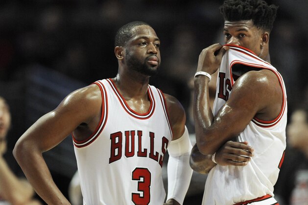 Chicago Bulls' Dwyane Wade (3) and Jimmy Butler (21) react during the final seconds of the second half of a NBA basketball game against the Portland Trail Blazers Monday, Dec. 5, 2016, in Chicago. Portland won 112-110. (AP Photo/Paul Beaty)
