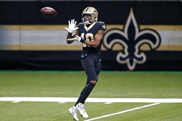 New Orleans Saints wide receiver Tre'Quan Smith (10) warms up before an NFL football game against the Tampa Bay Buccaneers in New Orleans, Sunday, Sept. 13, 2020. (AP Photo/Butch Dill)