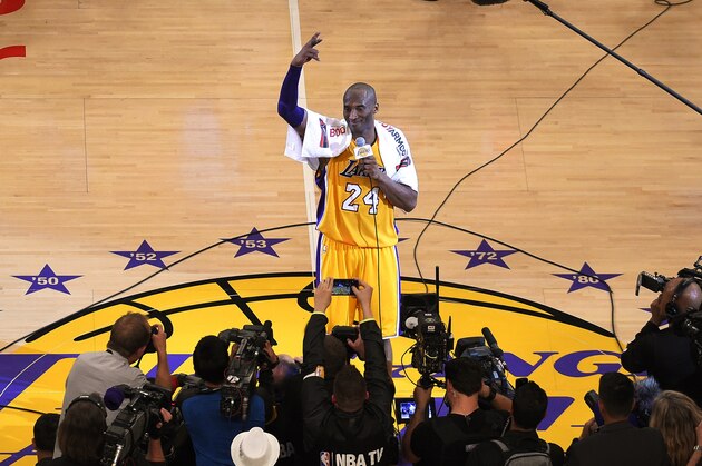 Los Angeles Lakers forward Kobe Bryant speaks to fans after the Lakers' NBA basketball game against the Utah Jazz, Wednesday, April 13, 2016, in Los Angeles. Bryant scored 60 points in what he said was his final NBA game as the Lakers won 101-96. (AP Photo/Mark J. Terrill)
