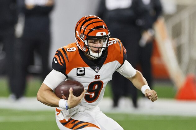 Cincinnati Bengals quarterback Joe Burrow runs the ball during the first half of an NFL football game Cleveland Browns, Thursday, Sept. 17, 2020, in Cleveland. (AP Photo/Ron Schwane)