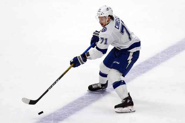 Tampa Bay Lightning center Anthony Cirelli works the puck across the blue line against the Dallas Stars during an NHL hockey game in Dallas, Monday, Jan. 27, 2020. Dallas won, 3-2 in overtime. (AP Photo/Ray Carlin)