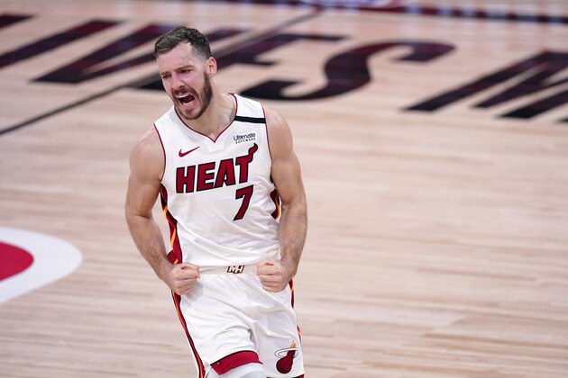 Miami Heat guard Goran Dragic (7) celebrates after sinking a basket against the Boston Celtics during the second half of an NBA conference final playoff basketball game, Thursday, Sept. 17, 2020, in Lake Buena Vista, Fla. (AP Photo/Mark J. Terrill)
