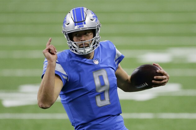 Detroit Lions quarterback Matthew Stafford (9) rushes against the Chicago Bears in the first half of an NFL football game in Detroit, Sunday, Sept. 13, 2020. (AP Photo/Duane Burleson) Detroit Lions quarterback Matthew Stafford (9) rushes against the Chicago Bears in the first half of an NFL football game in Detroit, Sunday, Sept. 13, 2020. (AP Photo/Duane Burleson)