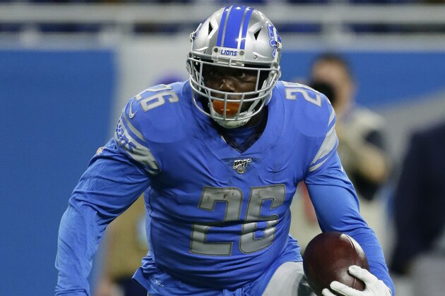 Detroit Lions running back C.J. Anderson (26) carries the ball against the Buffalo Bills during the first half of an NFL preseason football game in Detroit, Friday, Aug. 23, 2019. (AP Photo/Duane Burleson)