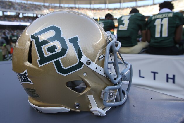 Baylor football helmet on the sidelines during their game with Rice at an NCAA college football game, Saturday, Sept. 26, 2015, in Waco, Texas. (AP Photo/Rod Aydelotte)