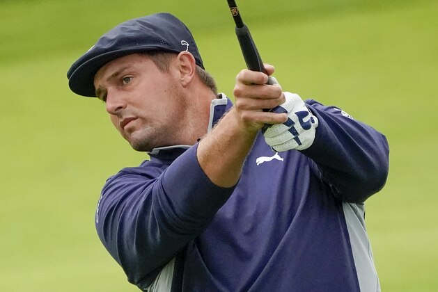 Bryson DeChambeau, of the United States, plays a shot off the 12th fairway during the second round of the US Open Golf Championship, Friday, Sept. 18, 2020, in Mamaroneck, N.Y. (AP Photo/Charles Krupa)