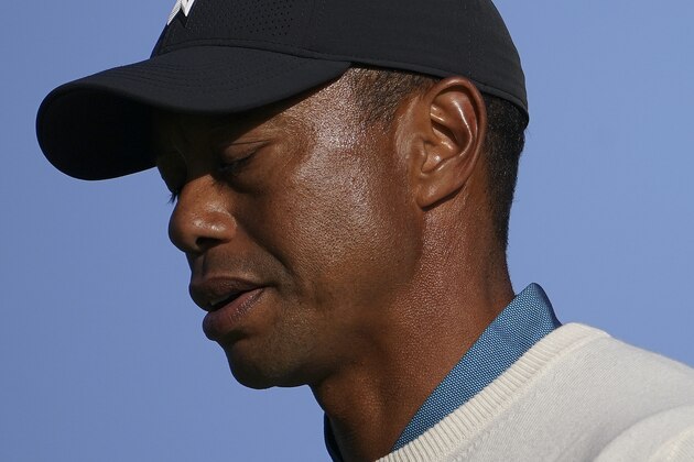 Tiger Woods, of the United States, walks off the fourth tee during the second round of the US Open Golf Championship, Friday, Sept. 18, 2020, in Mamaroneck, N.Y. (AP Photo/John Minchillo)