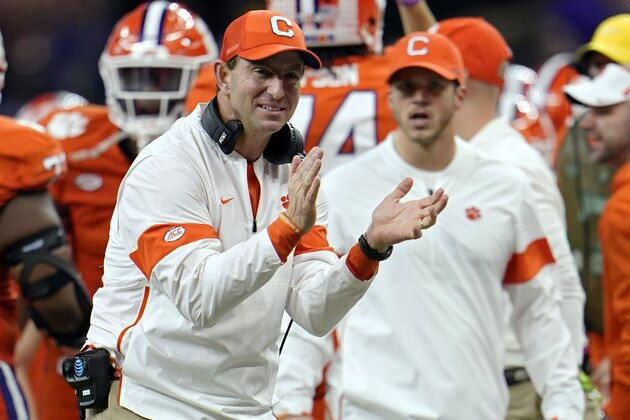 FILE - In this Jan. 13, 2020, file photo, Clemson head coach Dabo Swinney celebrates after his team scored during the second half of a NCAA College Football Playoff national championship game against LSU in New Orleans. Clemson is preseason No. 1 in The Associated Press Top 25, Monday, Aug. 24, 2020, a poll featuring nine Big Ten and Pac-12 teams that gives a glimpse at whatâ€™s already been taken from an uncertain college football fall by the pandemic.  (AP Photo/David J. Phillip, File)