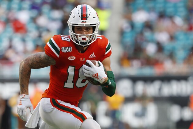 Miami quarterback Tate Martell runs for yardage during the first half of an NCAA college football game against Bethune-Cookman, Saturday, Sept. 14, 2019, in Miami Gardens, Fla. (AP Photo/Wilfredo Lee) Miami quarterback Tate Martell runs for yardage during the first half of an NCAA college football game against Bethune-Cookman, Saturday, Sept. 14, 2019, in Miami Gardens, Fla. (AP Photo/Wilfredo Lee)