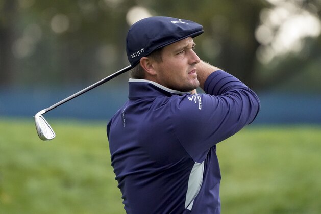 Bryson DeChambeau, of the United States, plays his shot from the 13th tee during the second round of the US Open Golf Championship, Friday, Sept. 18, 2020, in Mamaroneck, N.Y. (AP Photo/Charles Krupa)