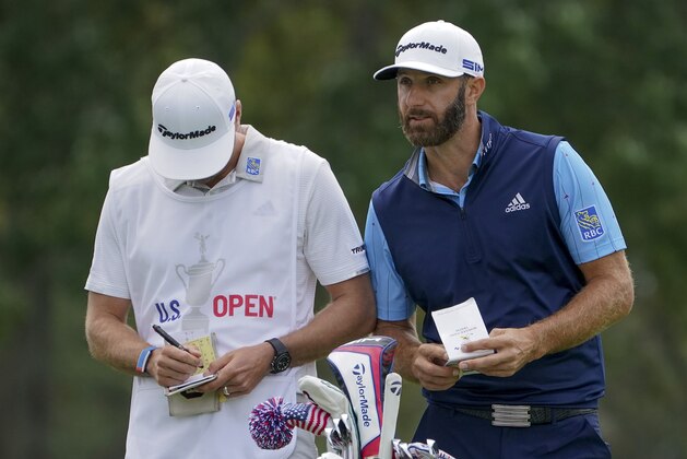 Dustin Johnson, of the United States, prepares to hit off the third tee during the second round of the US Open Golf Championship, Friday, Sept. 18, 2020, in Mamaroneck, N.Y. (AP Photo/John Minchillo)