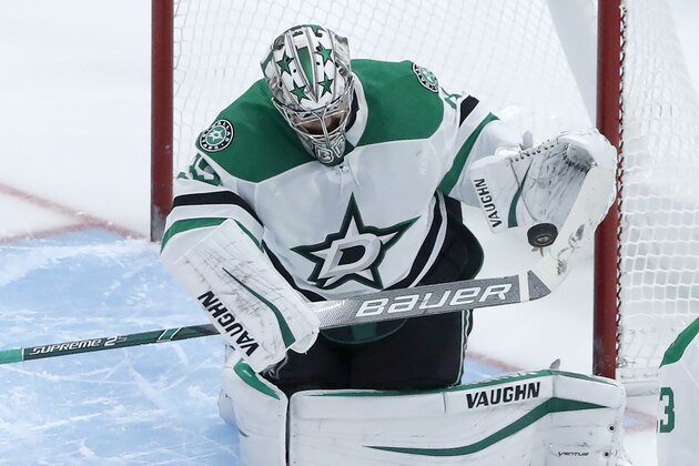 Dallas Stars goaltender Anton Khudobin (35) makes a glove save during the second period of an NHL hockey game against the Chicago Blackhawks Tuesday, Nov. 26, 2019, in Chicago. (AP Photo/Charles Rex Arbogast) Dallas Stars goaltender Anton Khudobin (35) makes a glove save during the second period of an NHL hockey game against the Chicago Blackhawks Tuesday, Nov. 26, 2019, in Chicago. (AP Photo/Charles Rex Arbogast)