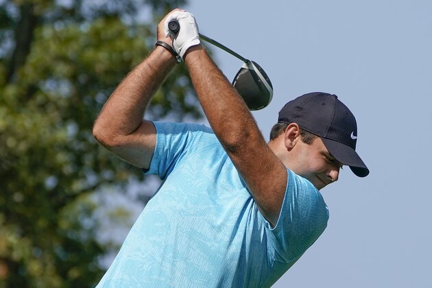 Patrick Reed, of the United States, plays his shot from the 14th tee during the second round of the US Open Golf Championship, Friday, Sept. 18, 2020, in Mamaroneck, N.Y. (AP Photo/Charles Krupa)