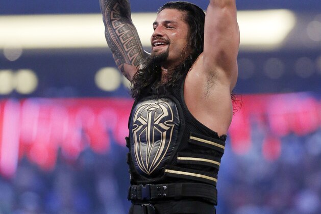 IMAGE DISTRIBUTED FOR WWE - WWE superstar new world heavy weight champion Roman Reigns celebrates his victory at WrestleMania 32 at AT&T Stadium on Sunday, April 3, 2016, in Arlington, Texas. (Brandon Wade/AP Images for WWE)