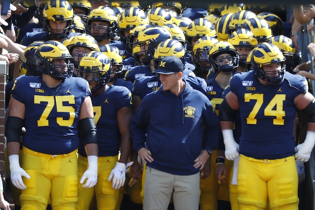Michigan head coach Jim Harbaugh waits to lead the team on the field before an NCAA college football game against Army in Ann Arbor, Mich., Saturday, Sept. 7, 2019. (AP Photo/Paul Sancya)