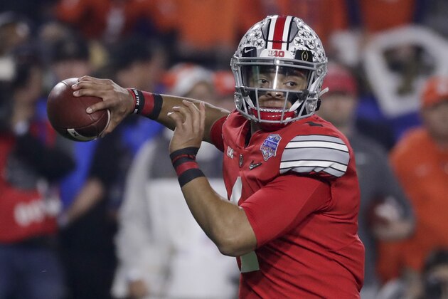 FILE - In this Dec. 28, 2019, file photo, Ohio State quarterback Justin Fields throws a pass against Clemson during the first half of the Fiesta Bowl NCAA college football playoff semifinal, in Glendale, Ariz. Clemson is preseason No. 1 in The Associated Press Top 25, Monday, Aug. 24, 2020, a poll featuring nine Big Ten and Pac-12 teams that gives a glimpse at whatâ€™s already been taken from an uncertain college football fall by the pandemic. Ohio State was a close No. 2. (AP Photo/Rick Scuteri, File)