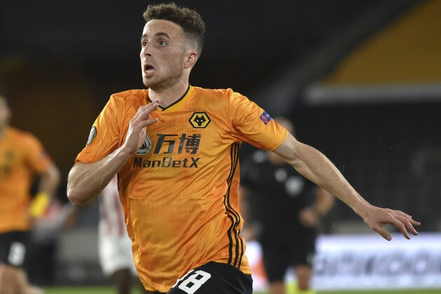 Wolverhampton Wanderers' Diogo Jota during the Europa League round 16 soccer match between Wolverhampton Wanderers and Olympiakos at the Molineux Stadium, in Wolverhampton, England, Thursday Aug. 6, 2020. (AP Photo/ Rui Vieira) Wolverhampton Wanderers' Diogo Jota during the Europa League round 16 soccer match between Wolverhampton Wanderers and Olympiakos at the Molineux Stadium, in Wolverhampton, England, Thursday Aug. 6, 2020. (AP Photo/ Rui Vieira)