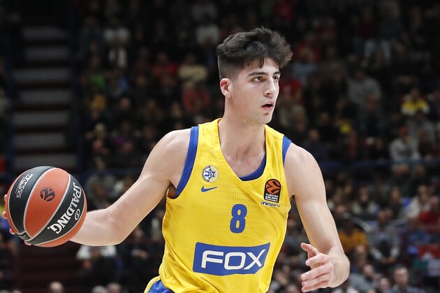 Maccabi Fox Tel Aviv's Deni Avdija controls the ball during the Euro League basketball match between Olimpia Milan and Maccabi Fox Tel Aviv, in Milan, Italy, Tuesday, Nov. 19, 2019. (AP Photo/Antonio Calanni)