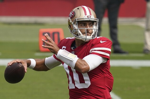 San Francisco 49ers quarterback Jimmy Garoppolo (10) passes against the Arizona Cardinals during the first half of an NFL football game in Santa Clara, Calif., Sunday, Sept. 13, 2020. (AP Photo/Tony Avelar)